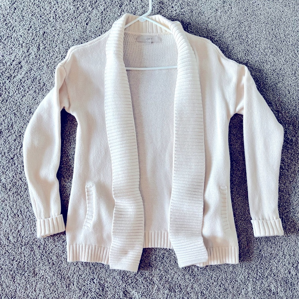 A cream elegant sweater